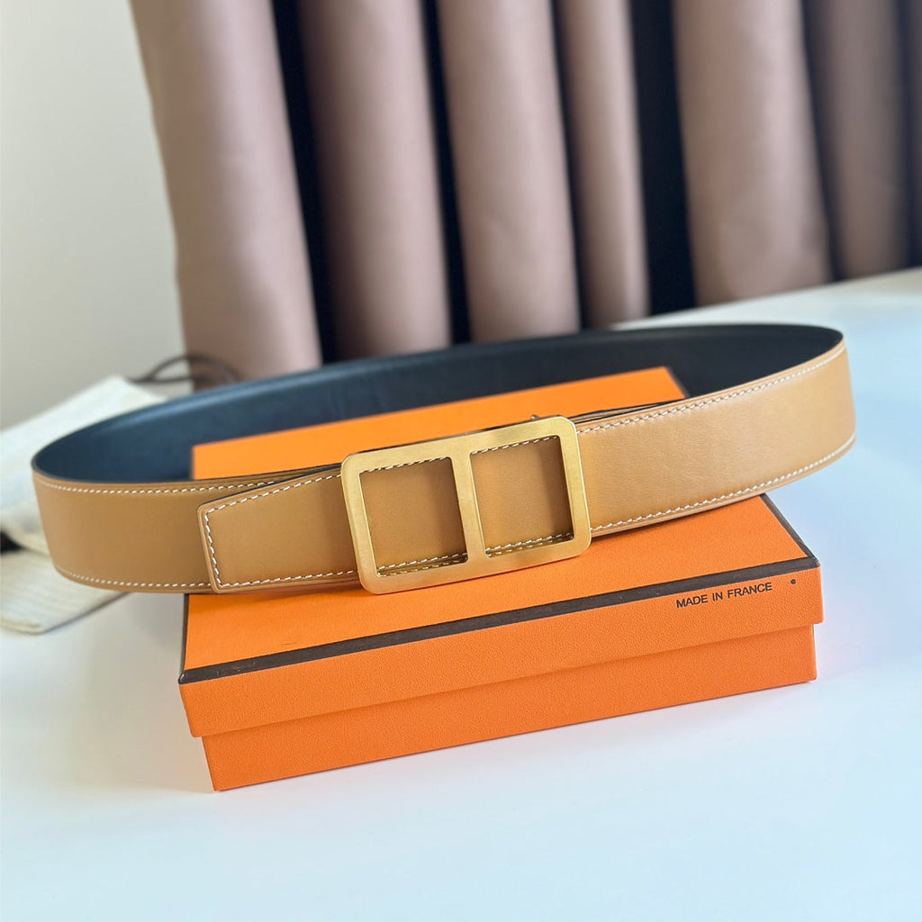 HERMES BELT BUCKLE & REVERSIBLE ORANGE PASTEL AND BLACK LEATHER STRAP 38MM GOLD HARDWARE