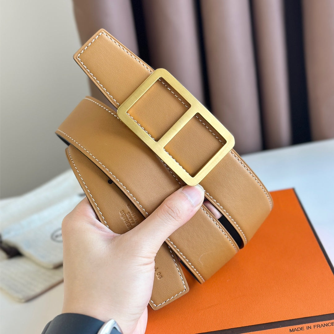 HERMES BELT BUCKLE & REVERSIBLE ORANGE PASTEL AND BLACK LEATHER STRAP 38MM GOLD HARDWARE