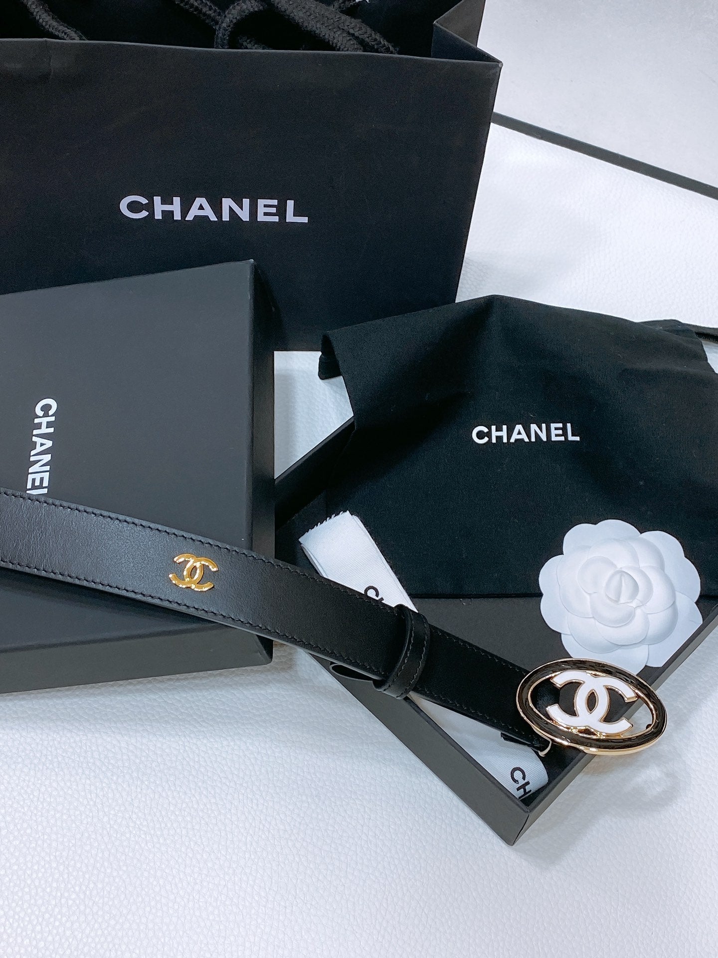 CHANEL 30MM BELT IN BLACK SMOOTH CALFSKIN WHITE MIX BLACK METAL LOGO GOLD HARDWARE