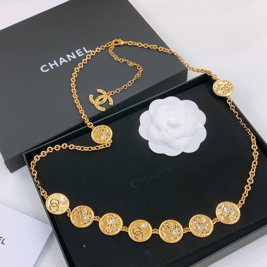 CHANEL TWISTED CHAIN BELT WITH RHINESTONES AND LOGO PLATE IN GOLD TONE