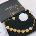 CHANEL TWISTED CHAIN BELT WITH RHINESTONES AND LOGO PLATE IN GOLD TONE