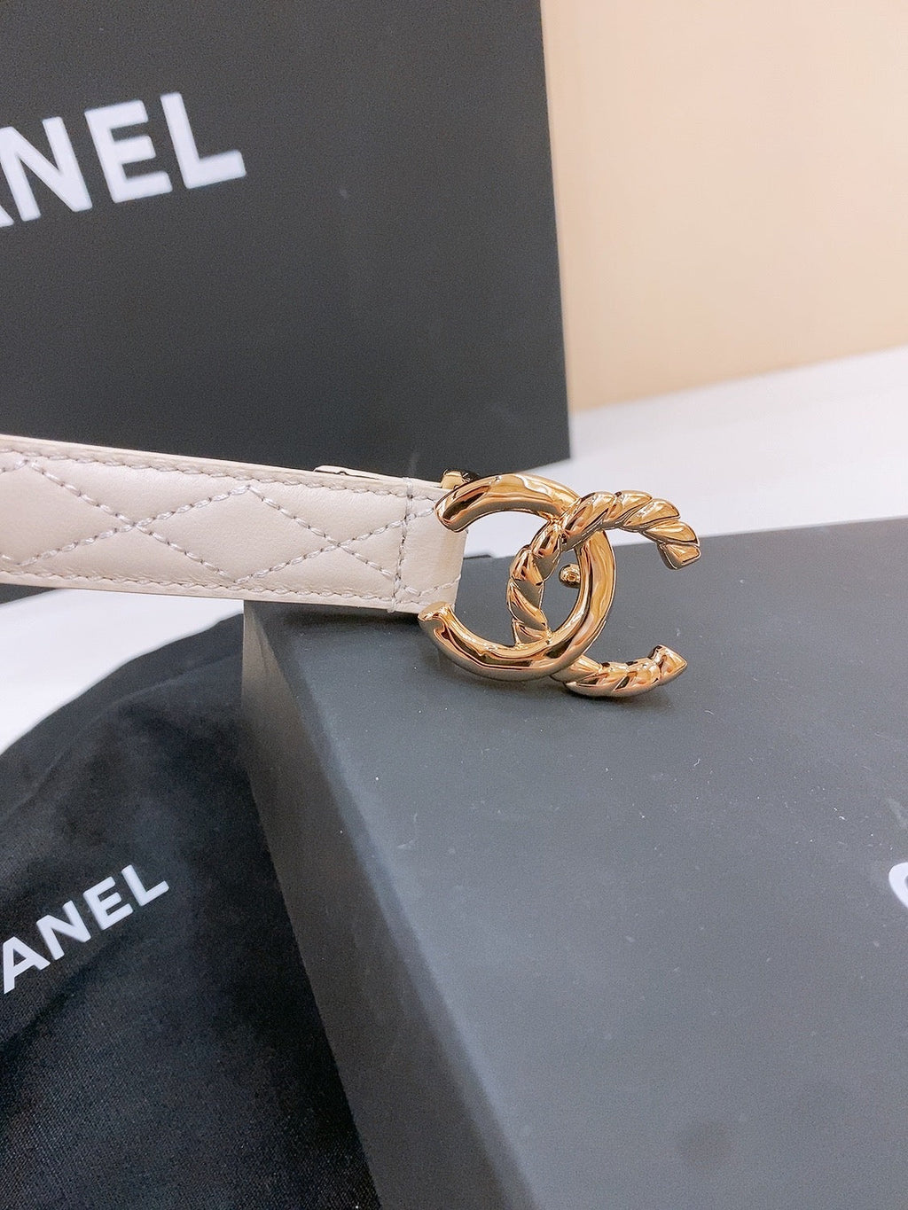 CHANEL DOUBLE C BELT 20MM IN WHITE CALFSKIN WITH QUILTED STITCHING SPIRAL GOLD BUCKLE